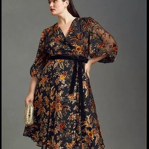 Black and orange Hutch velvet wrap dress.
